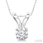 1/10 Ctw Round Cut Diamond Solitaire Pendant in 14K White Gold with Chain