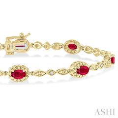 5x3 MM Oval Cut Ruby and 1/20 Ctw Round Cut Diamond Bracelet in 10K Yellow Gold