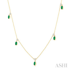 5x3 MM Oval Shape Emerald and 1/8 Ctw Round Cut Diamonds Precious Station Necklace in 10K Yellow Gold