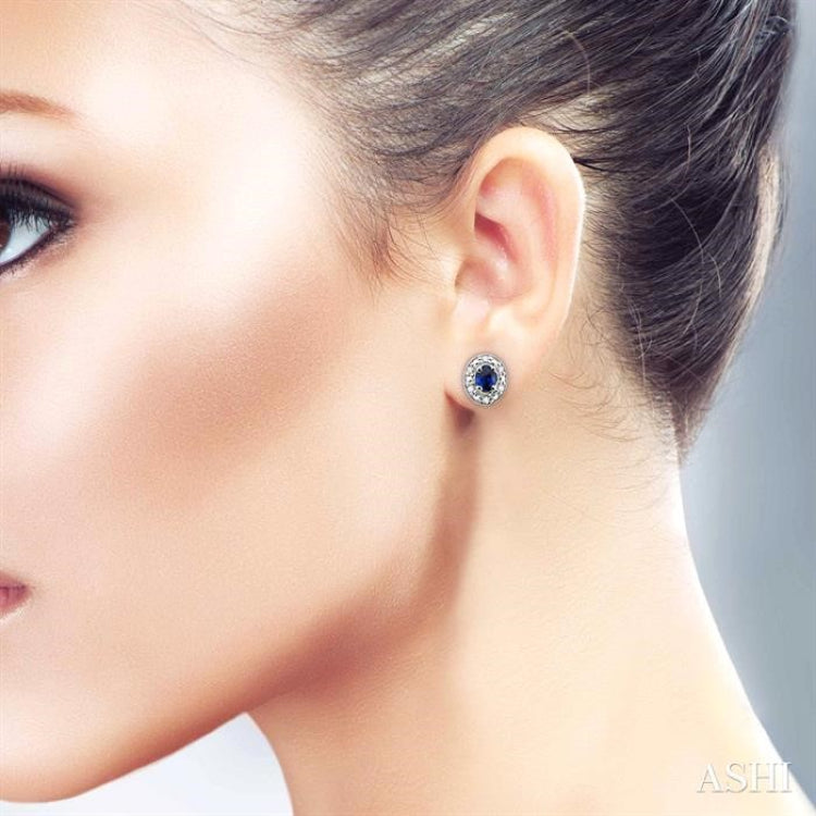 4x3 MM Oval Shaped Sapphire and 1/10 Ctw Round Cut Diamond Earrings in 14K White Gold