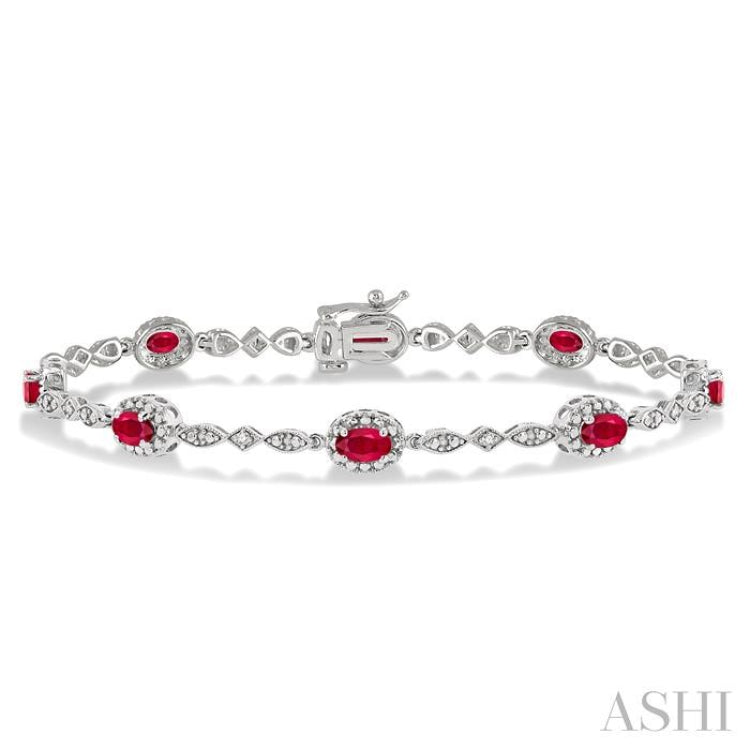 5x3 MM Oval Cut Ruby and 1/20 Ctw Round Cut Diamond Bracelet in 14K White Gold