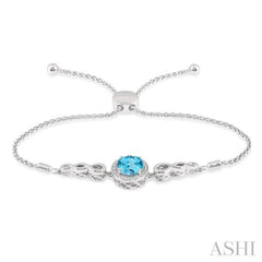 10x8 MM Oval Shape Blue Topaz and 1/20 Ctw Round shape Diamond Sterling Silver Lariat Bracelet
