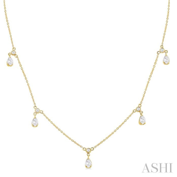5/8 Ctw Dangle Pear and Round Cut Diamond Station Necklace in 14K Yellow Gold